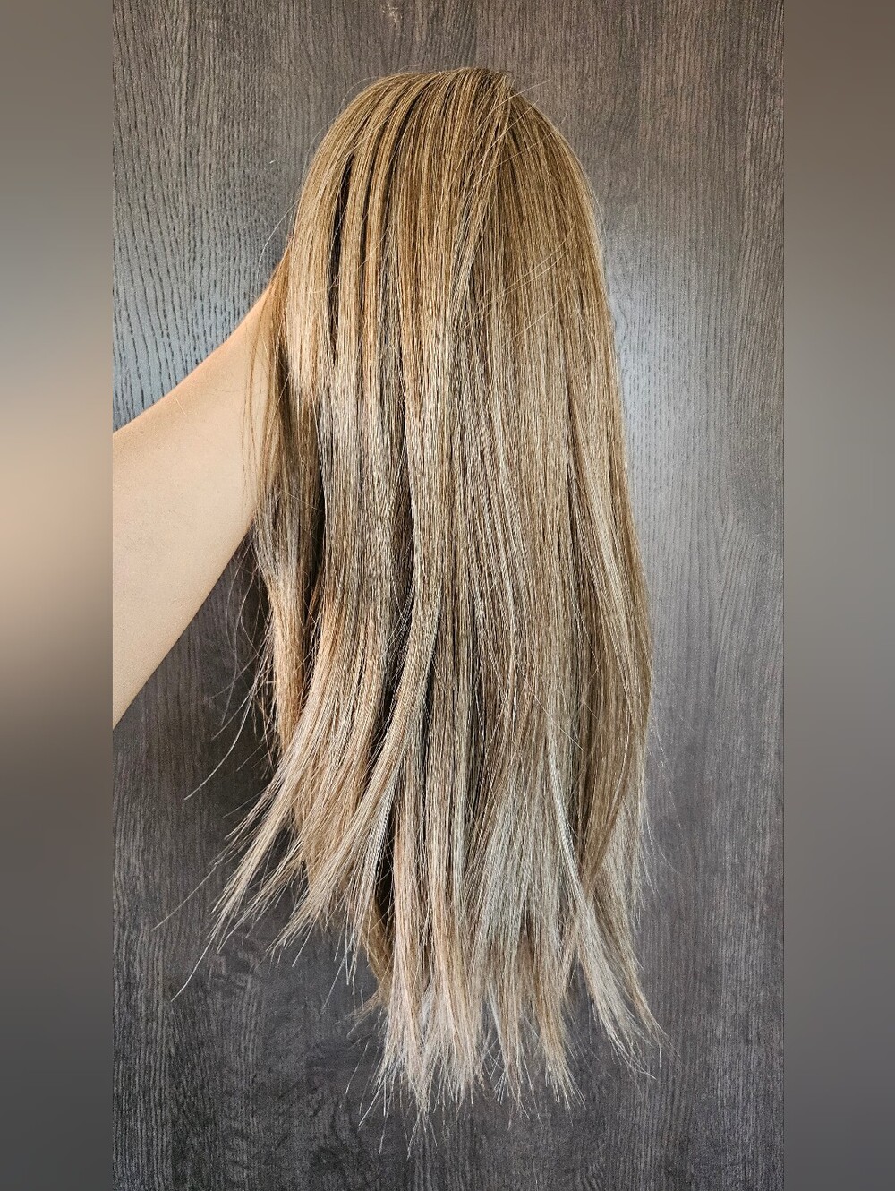 Hair piece, i believe the color may be ash blonde or a light brown.